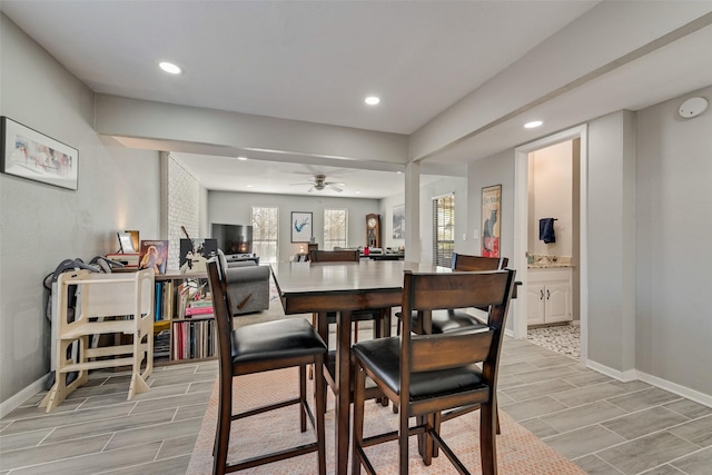 702 Middle Glen Dr, Garland, TX 75043 - dining area featuring baseboards, recessed lighting, wood tiled floor, and ceiling fan