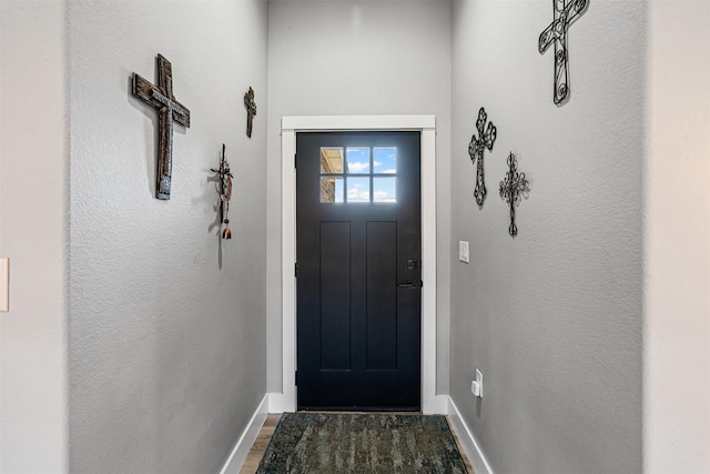 2500 Creek Dr, Granbury, TX 76048 - entryway featuring baseboards, wood finished floors, and a textured wall