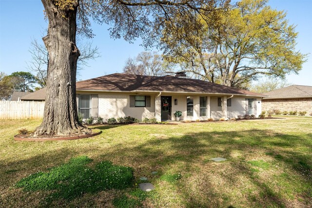 118 Carmel Dr, Bullard, TX 75757 - ranch-style home with brick siding, a chimney, a front lawn, and fence