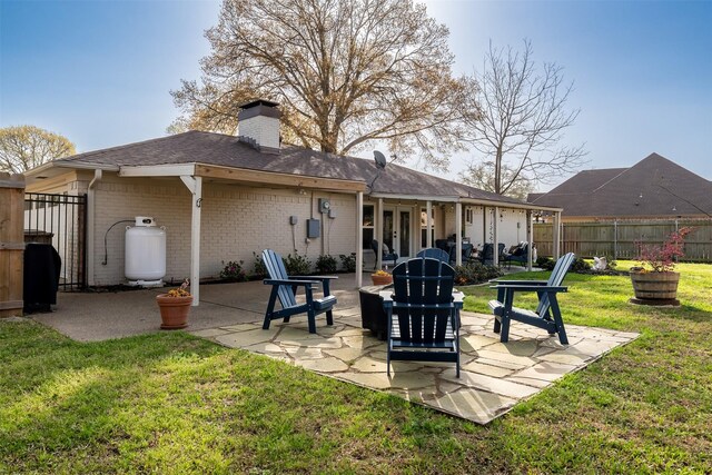 118 Carmel Dr, Bullard, TX 75757 - rear view of property with fence, french doors, a yard, a chimney, and a patio area