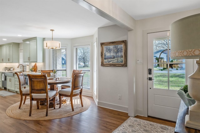 118 Carmel Dr, Bullard, TX 75757 - dining space featuring a notable chandelier, recessed lighting, baseboards, and wood finished floors