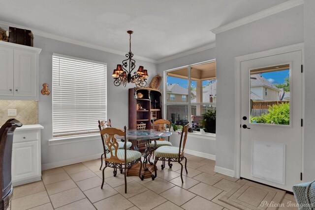 118 Hallette Dr, Shreveport, LA 71115 - dining space featuring a chandelier, plenty of natural light, light tile patterned floors, and ornamental molding