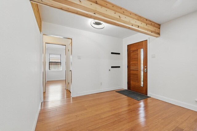 3444 Rockmartin Dr, Farmers Branch, TX 75234 - foyer with light wood-style flooring and baseboards