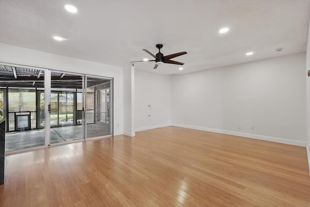 3444 Rockmartin Dr, Farmers Branch, TX 75234 - unfurnished living room featuring recessed lighting, beamed ceiling, light wood-style flooring, a sink, and baseboards