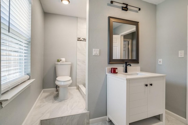 4428 Private Rd Unit 5216, Princeton, TX 75407 - full bathroom featuring baseboards, marble finish floor, toilet, tiled shower, and vanity