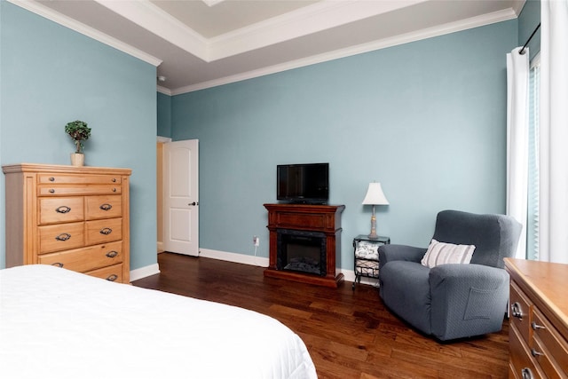 bedroom with crown molding, baseboards, dark wood finished floors, and a fireplace