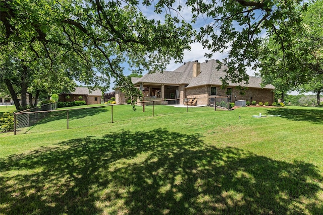 view of yard featuring fence