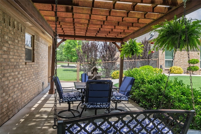 view of patio / terrace with fence and outdoor dining space