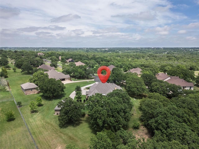 bird's eye view with a forest view