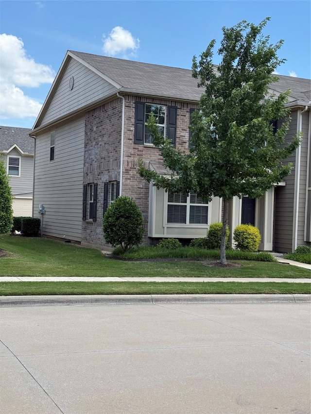6836 Pascal Way, Fort Worth, TX 76137 - view of home's exterior featuring a yard and brick siding