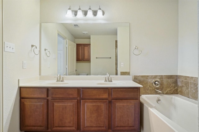 6836 Pascal Way, Fort Worth, TX 76137 - bathroom with a bath and double vanity