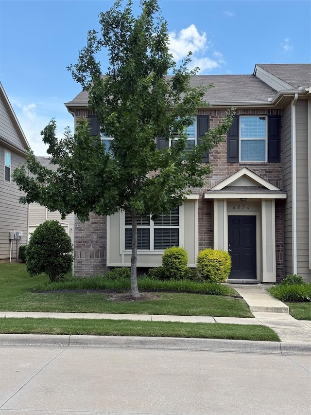 6836 Pascal Way, Fort Worth, TX 76137 - view of front facade with brick siding and a shingled roof