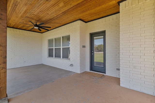 111 Sharla Smelley Rd, Weatherford, TX 76088 - doorway to property featuring a ceiling fan, a patio area, and brick siding