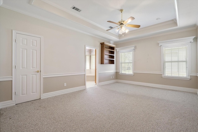4288 Fm 1652, Grand Saline, TX 75140 - empty room with visible vents, carpet flooring, a raised ceiling, and a ceiling fan