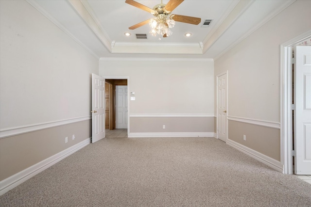 4288 Fm 1652, Grand Saline, TX 75140 - unfurnished bedroom with visible vents, light colored carpet, baseboards, and a tray ceiling