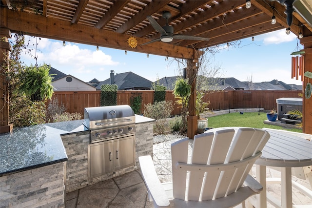 view of patio featuring a fenced backyard, a ceiling fan, a pergola, and area for grilling