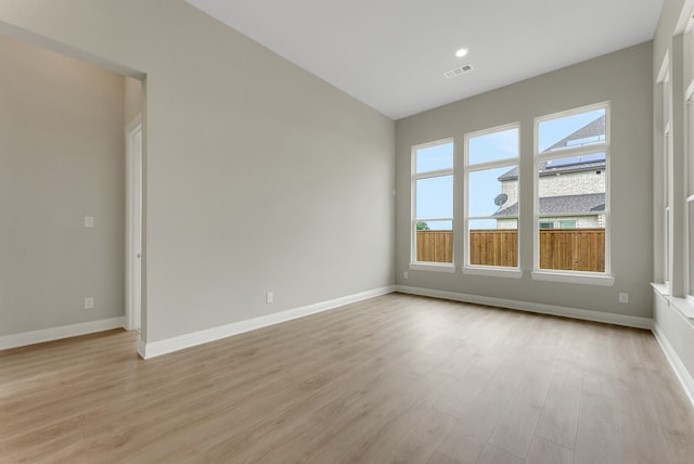9828 Palermo Ln, Mesquite, TX 75126 - empty room with light wood-type flooring, recessed lighting, baseboards, and visible vents