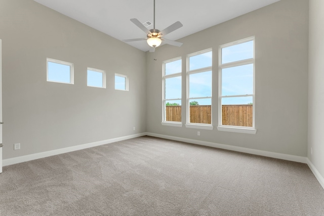 9828 Palermo Ln, Mesquite, TX 75126 - carpeted empty room with baseboards, ceiling fan, and visible vents