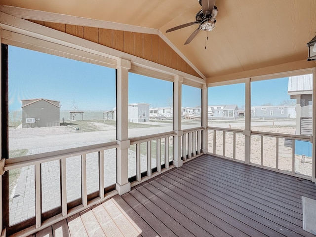 6400 Peninsula Rd, Kerens, TX 75144 - unfurnished sunroom featuring a wealth of natural light, a residential view, and a ceiling fan
