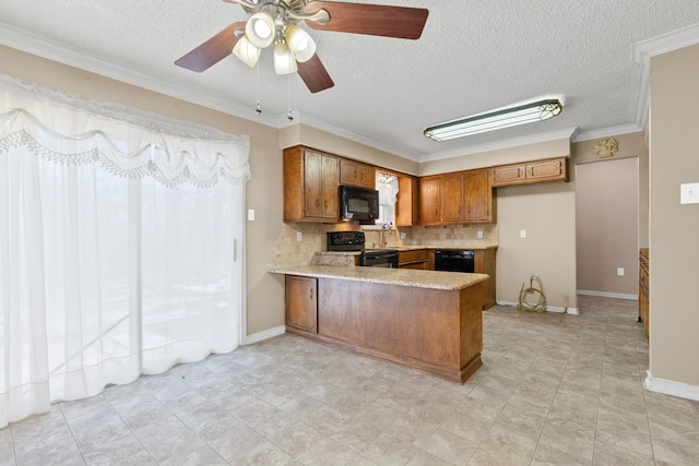 kitchen with backsplash, light countertops, brown cabinets, a peninsula, and black appliances