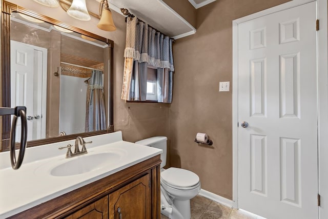 bathroom with vanity, baseboards, tile patterned flooring, curtained shower, and toilet