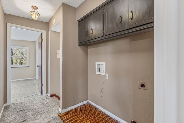laundry room featuring washer hookup, cabinet space, dark colored carpet, baseboards, and hookup for an electric dryer