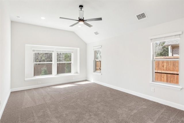 216 Dove Haven Dr, Wylie, TX 75098 - carpeted empty room featuring ceiling fan, healthy amount of natural light, baseboards, and vaulted ceiling