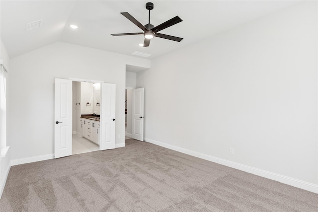 216 Dove Haven Dr, Wylie, TX 75098 - unfurnished bedroom featuring light colored carpet, lofted ceiling, baseboards, connected bathroom, and a ceiling fan