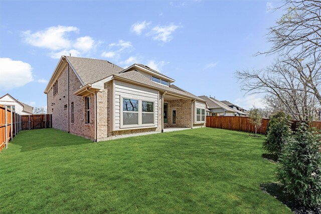 216 Dove Haven Dr, Wylie, TX 75098 - rear view of house featuring brick siding and a shingled roof