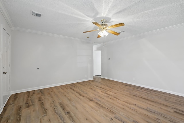 3414 Dartmouth Dr, Irving, TX 75062 - unfurnished room featuring visible vents, a ceiling fan, crown molding, and a textured ceiling