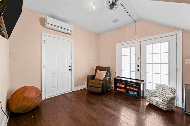 4001 Roswell St, Dallas, TX 75219 - sitting room with a wall mounted AC, hardwood / wood-style floors, vaulted ceiling, and baseboards