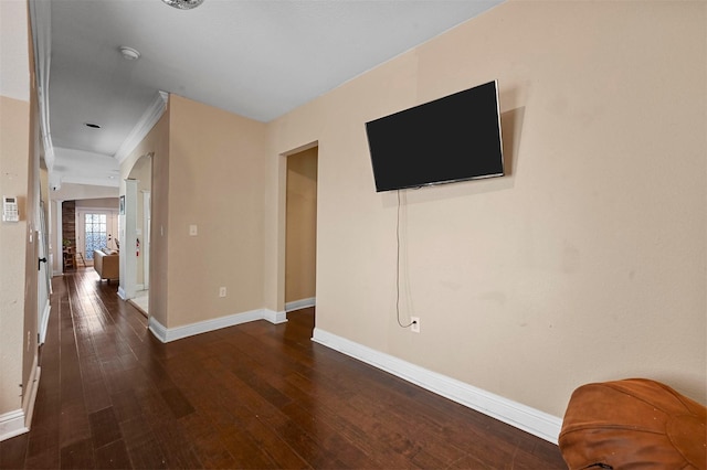 4001 Roswell St, Dallas, TX 75219 - unfurnished living room with baseboards, dark wood finished floors, and ornamental molding