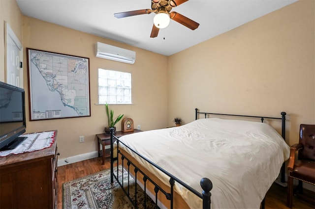 4001 Roswell St, Dallas, TX 75219 - bedroom featuring an AC wall unit, wood finished floors, baseboards, and ceiling fan