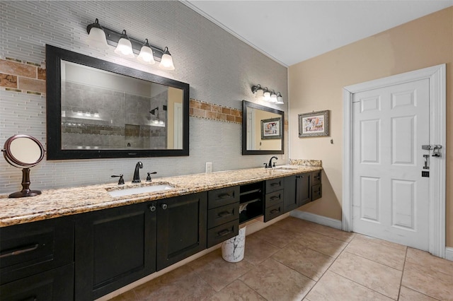 4001 Roswell St, Dallas, TX 75219 - full bathroom featuring double vanity, a walk in shower, tile patterned flooring, backsplash, and baseboards