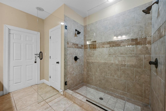 4001 Roswell St, Dallas, TX 75219 - full bath with a tile shower and tile patterned floors