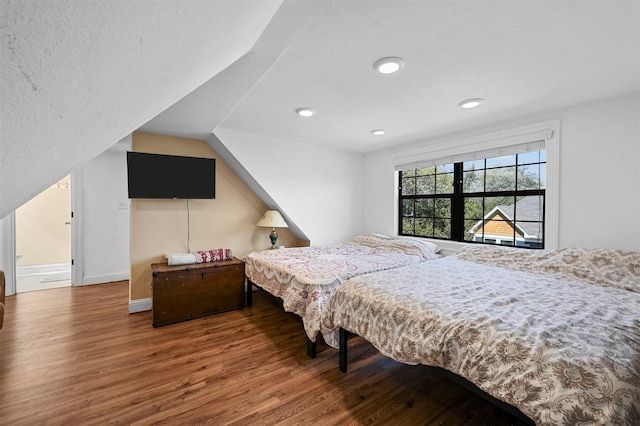 4001 Roswell St, Dallas, TX 75219 - bedroom with wood finished floors, baseboards, and recessed lighting
