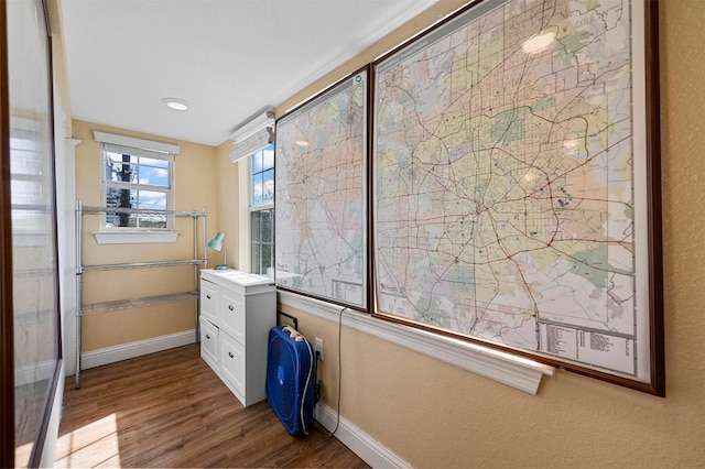 4001 Roswell St, Dallas, TX 75219 - home office featuring dark wood-type flooring and baseboards