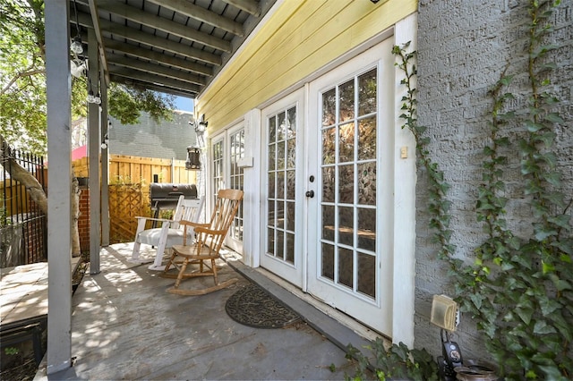 4001 Roswell St, Dallas, TX 75219 - view of patio featuring french doors and grilling area