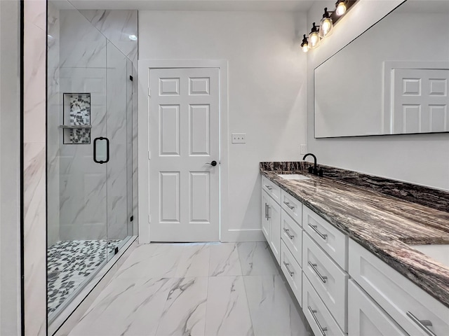 114 Trailridge Dr, Corsicana, TX 75110 - full bath with a marble finish shower, a sink, double vanity, baseboards, and marble finish floor