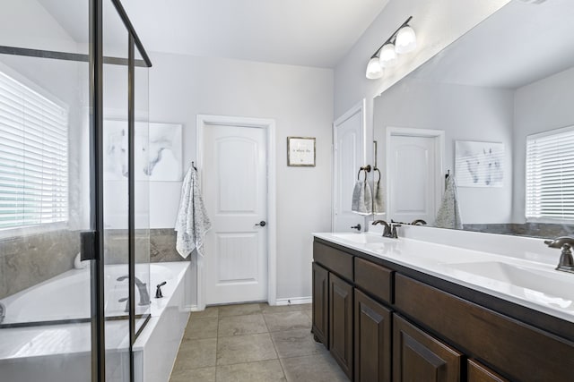 1753 Rio Penasco Rd, Fort Worth, TX 76052 - full bathroom with a garden tub, healthy amount of natural light, double vanity, and a stall shower