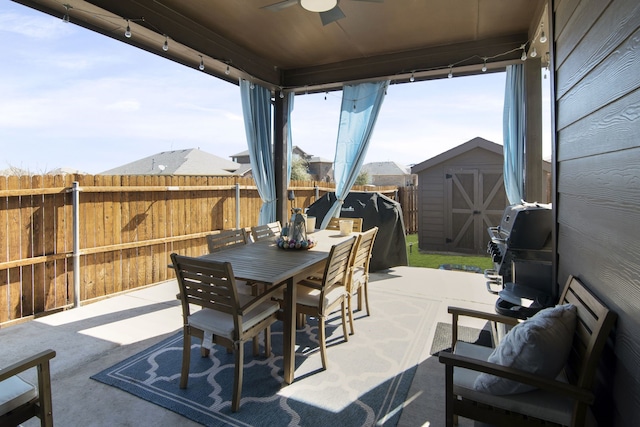 1753 Rio Penasco Rd, Fort Worth, TX 76052 - fenced backyard featuring outdoor dining area, ceiling fan, a patio area, and a shed