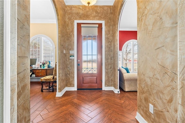 8 Republic Dr, Waco, TX 76708 - entrance foyer with ornamental molding, arched walkways, healthy amount of natural light, and baseboards