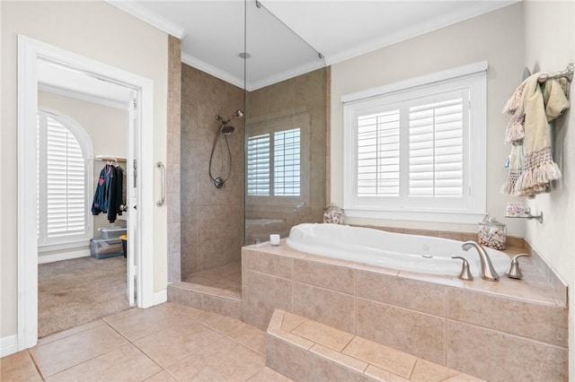8 Republic Dr, Waco, TX 76708 - bathroom with a garden tub, walk in shower, tile patterned flooring, ornamental molding, and a walk in closet
