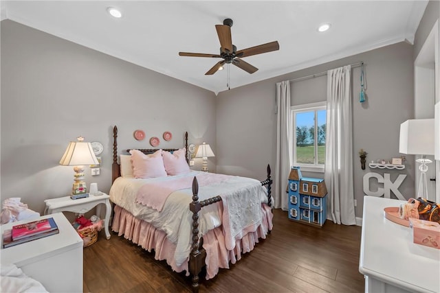 bedroom with recessed lighting, a ceiling fan, dark wood finished floors, and crown molding