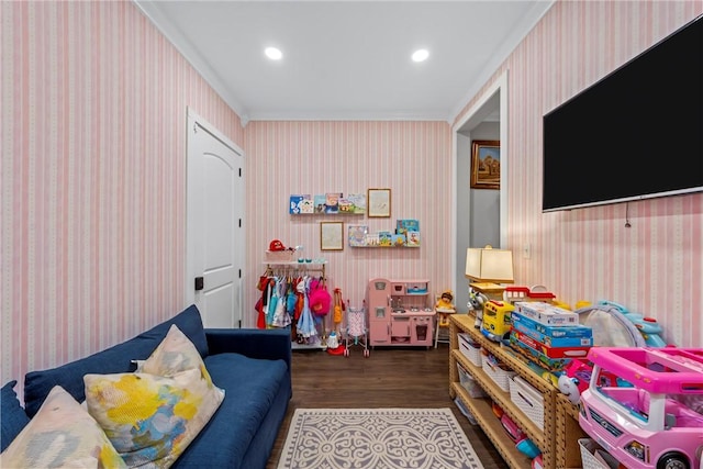 rec room with recessed lighting, wood finished floors, and wallpapered walls