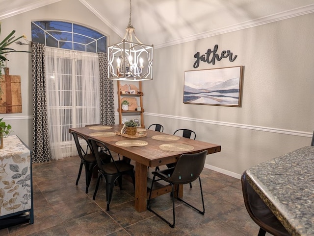 dining room with vaulted ceiling, ornamental molding, baseboards, and a chandelier