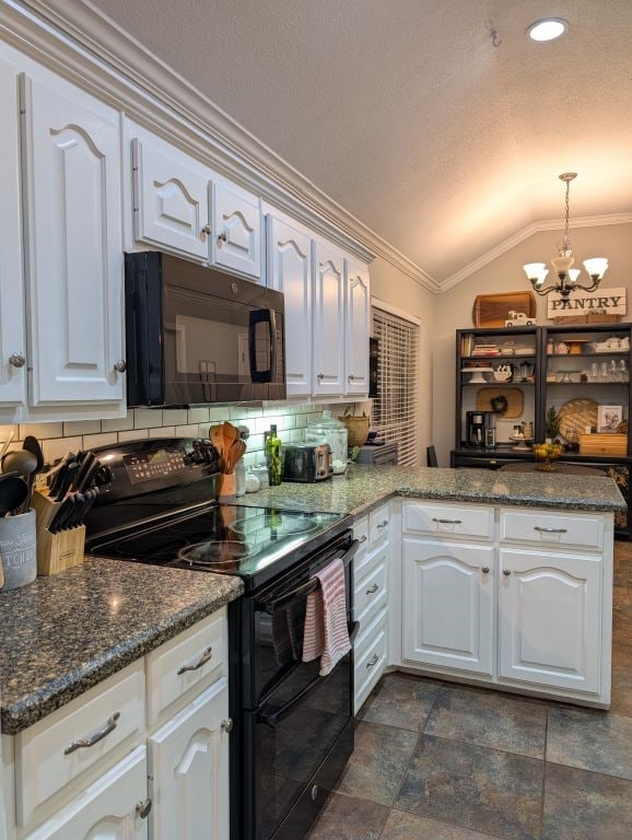 kitchen featuring a notable chandelier, black appliances, tasteful backsplash, crown molding, and vaulted ceiling