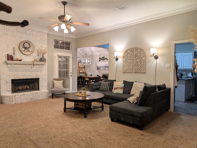 living area featuring visible vents, carpet floors, ornamental molding, ceiling fan, and a brick fireplace