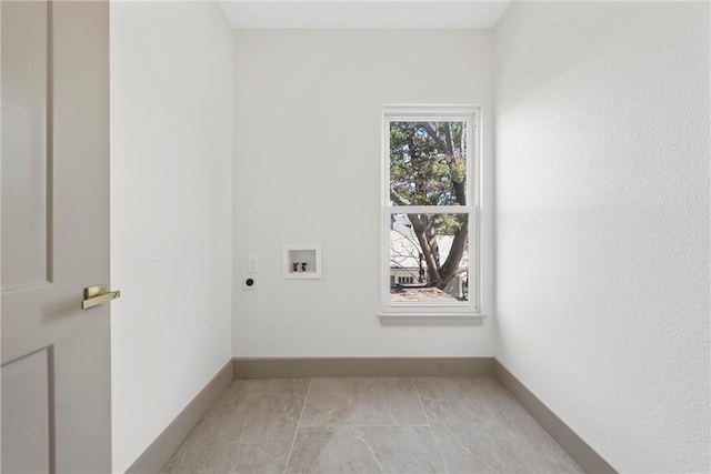 2211 Morrow Ave, Waco, TX 76707 - washroom with electric dryer hookup, washer hookup, and baseboards