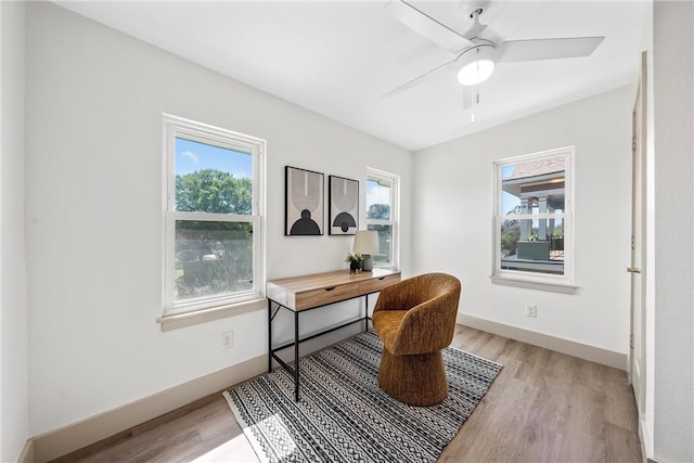 2211 Morrow Ave, Waco, TX 76707 - office space with light wood-type flooring, a ceiling fan, and baseboards